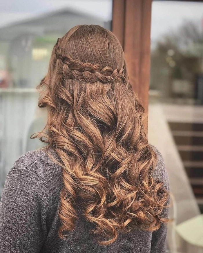 Elegant prom hairstyle for tightly coiled natural hair with intricate twists