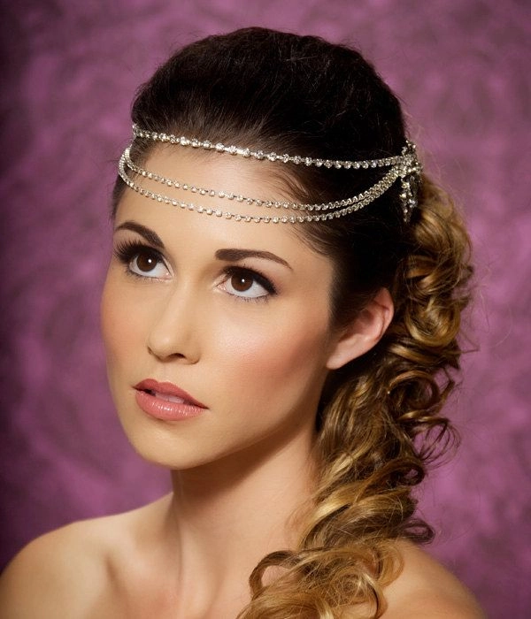 Prom Hairstyles with Crystal Headbands for a Sparkling Look Image 2 Elegant prom hairstyle featuring a crystal headband with soft curls