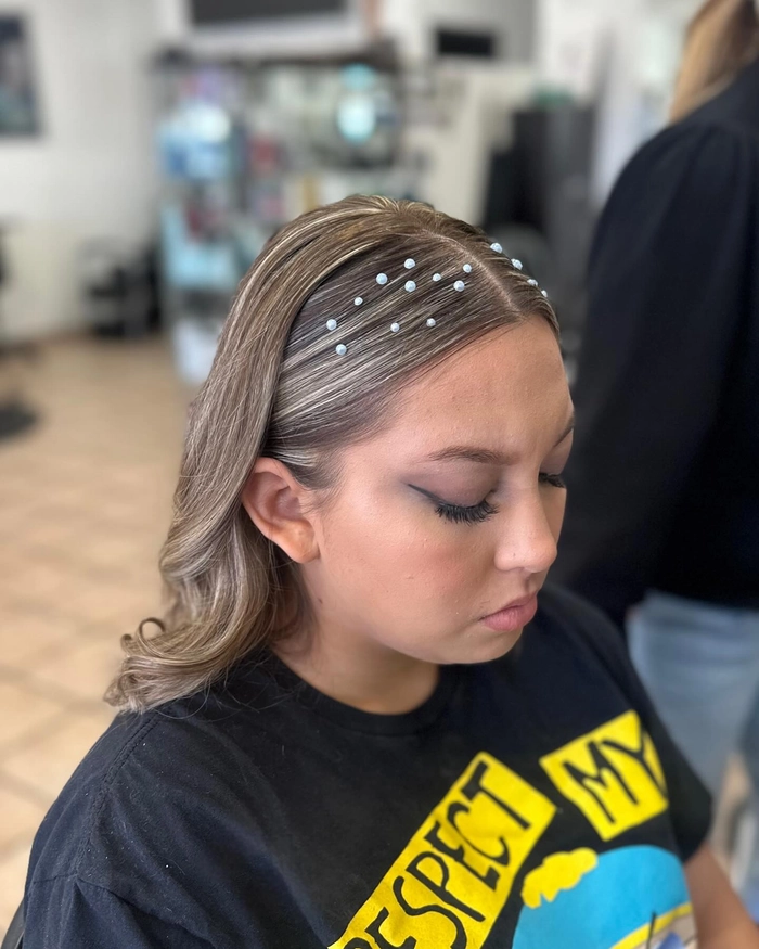 Glamorous prom hairstyle featuring delicate crystal headbands perfect for special occasions Elegant prom hairstyle adorned with sparkling crystal headbands