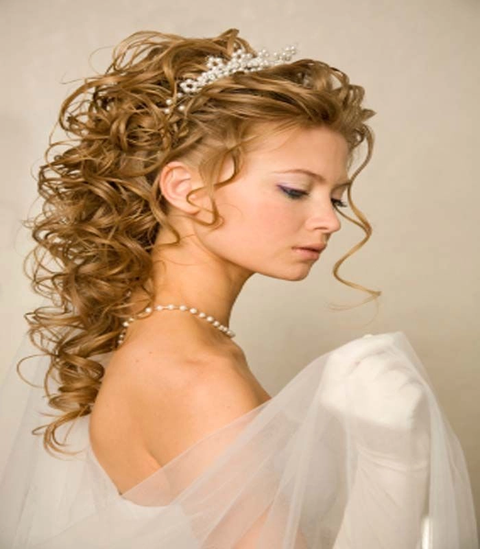 Prom Hairstyles Inspiration Image 10 with a subtle and graceful tiara accessory Elegant prom hairstyle featuring a delicate tiara with intricate details