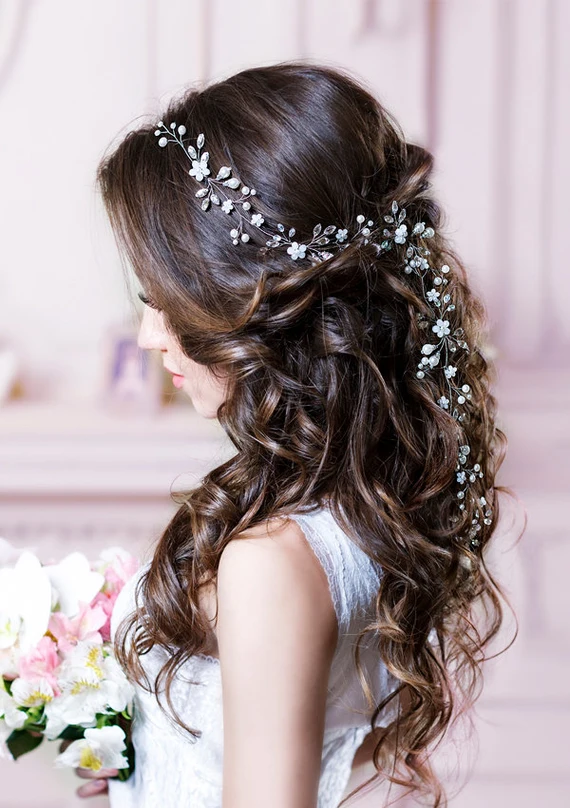 Chic prom hairstyle featuring beautiful floral hair vines for a stunning look Elegant prom hairstyle adorned with delicate floral hair vines