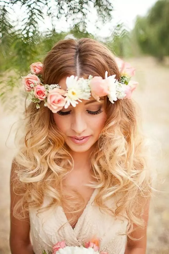 Elegant prom hairstyle adorned with fresh flower crowns for a natural look