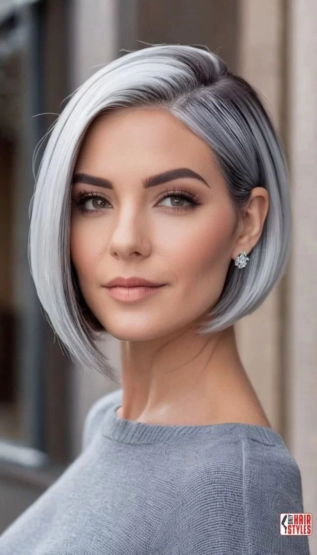 Elegant prom hairstyle for silver grey hair with soft curls and floral accessories