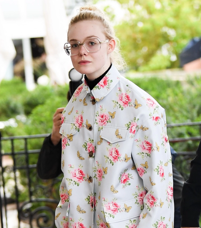 Elegant prom hairstyle perfectly suited for wearing glasses and highlighting facial features