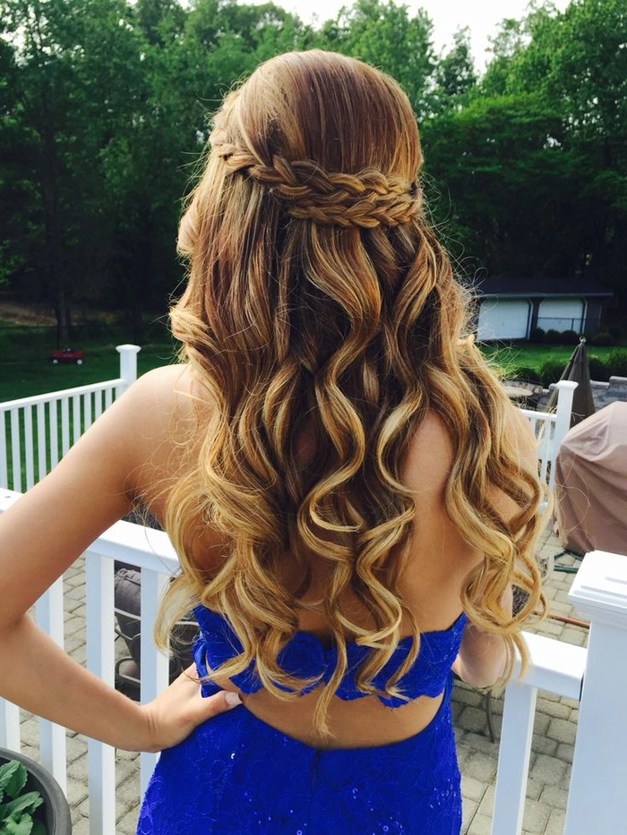 Elegant prom hairstyle with intricate curls perfect for a grand ballroom setting
