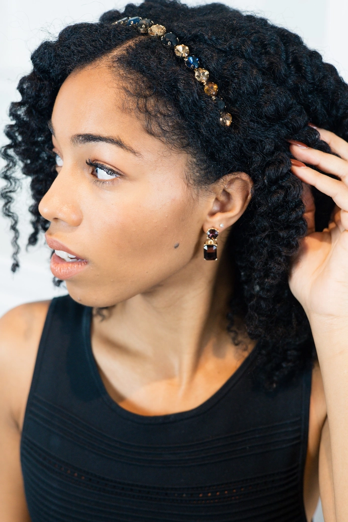Elegant prom hairstyle featuring jeweled hair cuffs for a glamorous look
