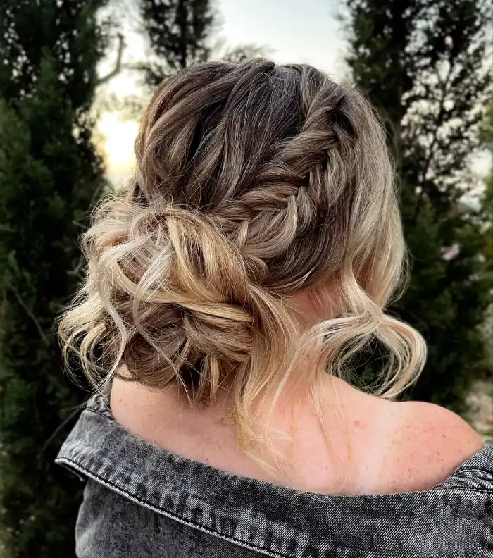 Trendy prom hairstyle idea for medium length straight hair with subtle volume and sparkling accessories Elegant prom hairstyle for medium length straight hair with soft curls and decorative hairpins