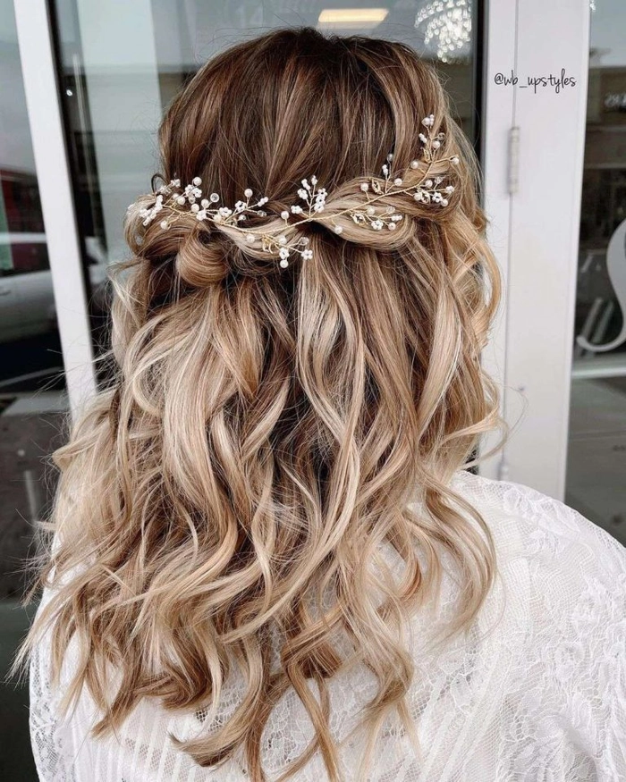 Prom hairstyle inspiration with a middle part for a flawless prom look Elegant prom hairstyle featuring a sleek middle part and soft curls