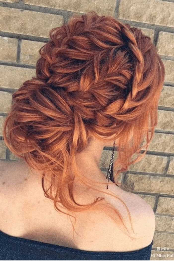 Elegant updo showcasing prom hairstyles for vibrant red hair