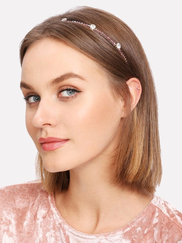 Elegant prom hairstyle adorned with sparkling rhinestone hair clips