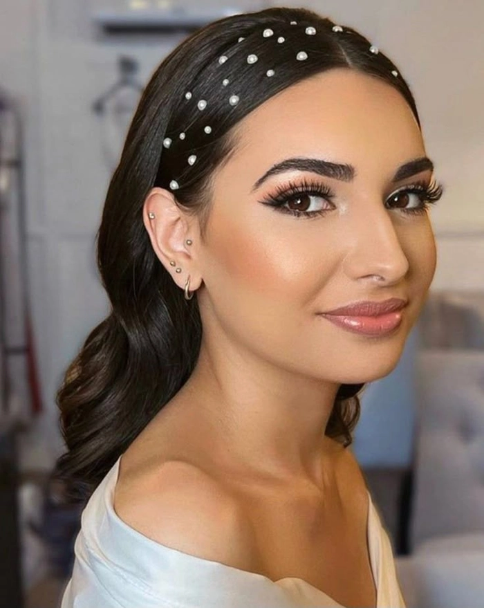 Elegant prom hairstyle adorned with sparkling rhinestone hair clips