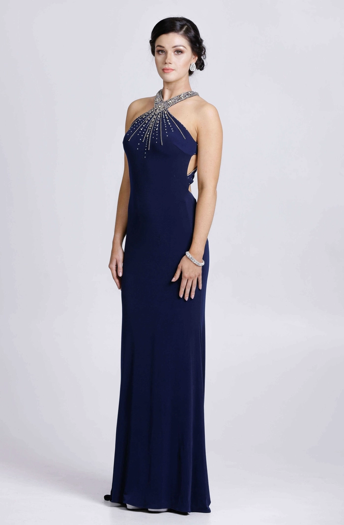 Elegant prom hairstyle showcasing soft curls paired with a halter neck dress