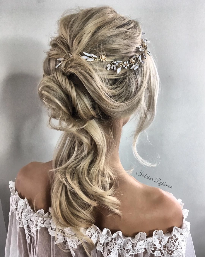 Elegant prom hairstyle complementing a sweetheart neckline gown with soft curls