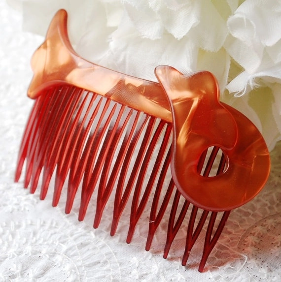 Stylish prom hairstyle adorned with classic vintage hair combs for a timeless look Elegant prom hairstyle featuring vintage hair combs and soft curls
