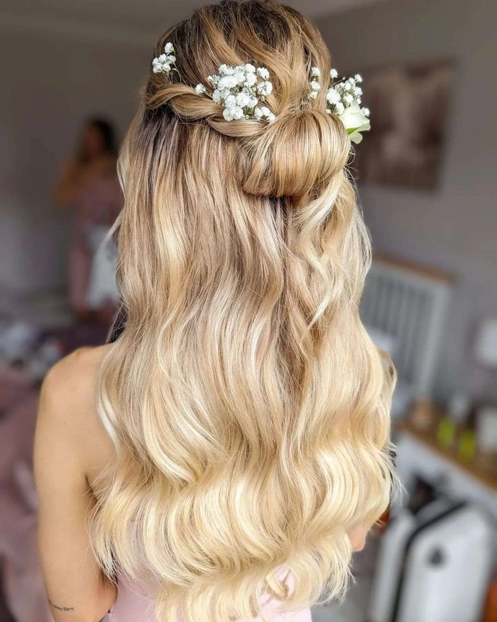 Elegant long prom hairstyle for natural curly hair with soft waves