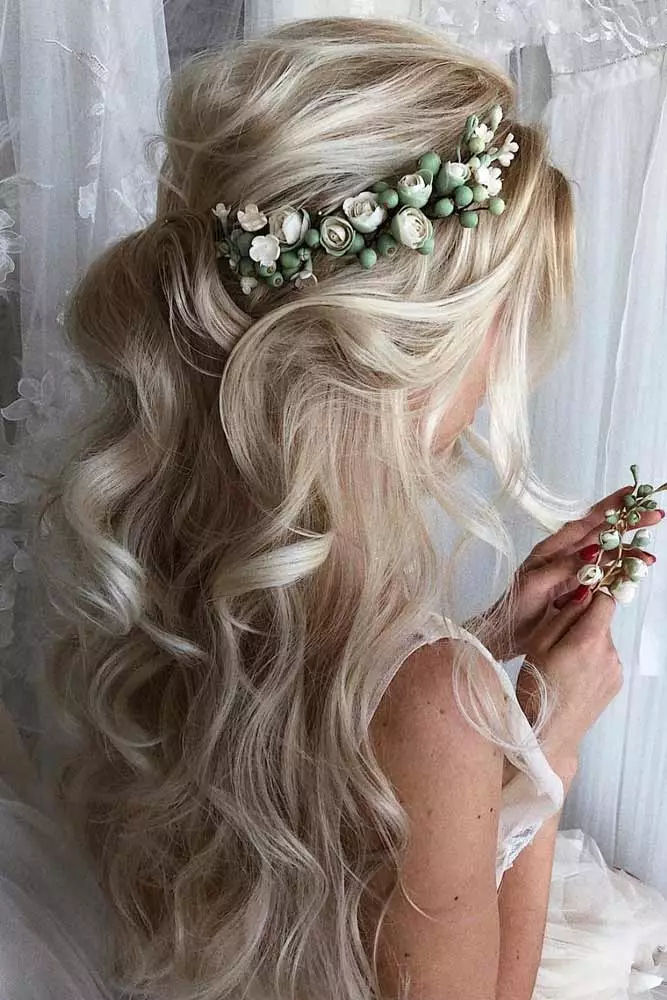 Stunning prom look showcasing flowing waves perfect for long hair styles Elegant prom hairstyle featuring long wavy hair with soft curls and subtle highlights