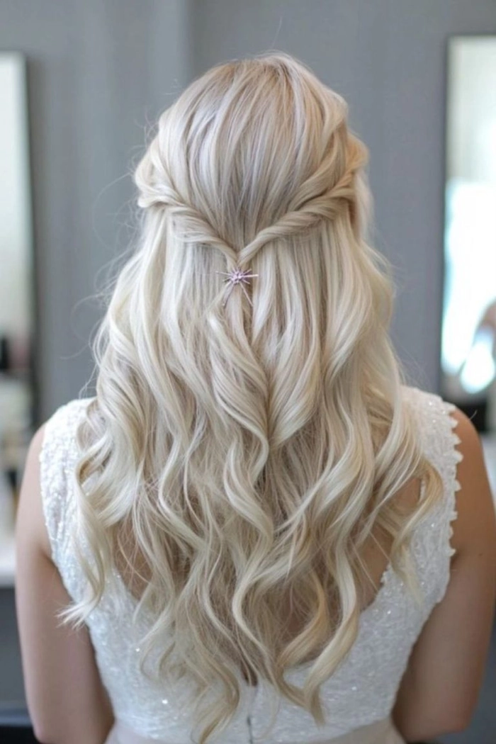 Stunning prom look featuring long wavy hair styled with delicate waves and embellishments Elegant prom hairstyle for long wavy hair with soft curls and a floral accessory
