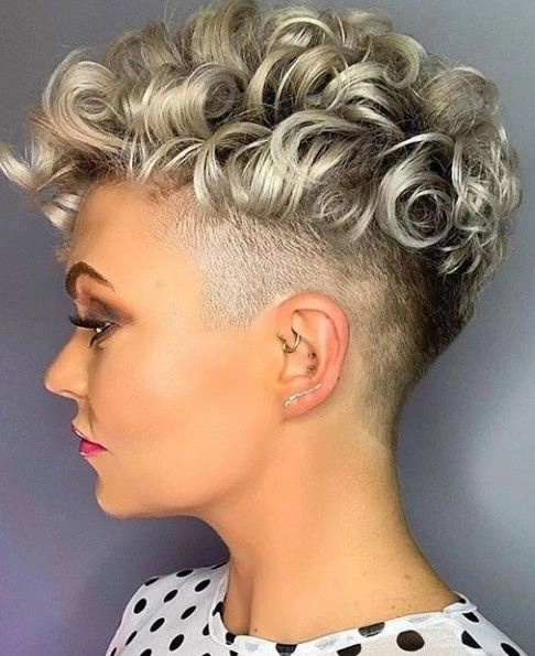 Elegant prom hairstyle on a short pixie cut with soft curls and decorative accessories