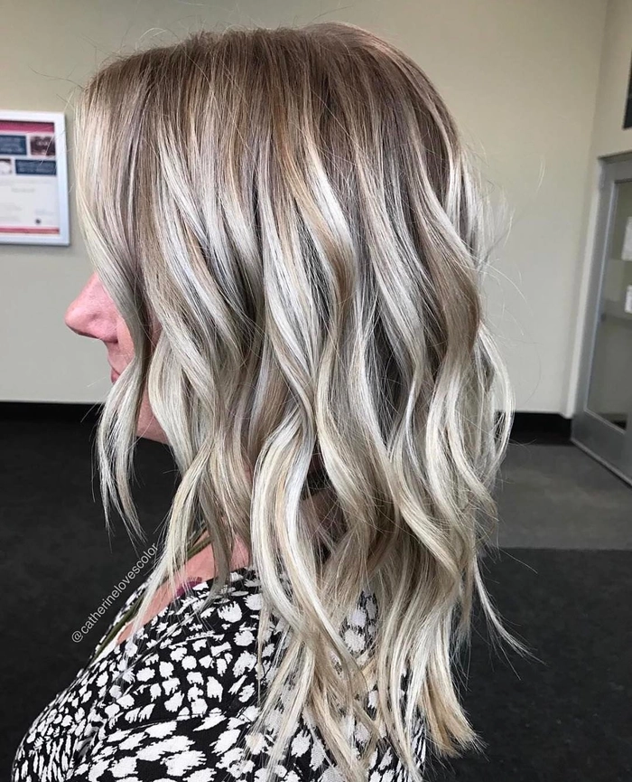 Elegant updo showcasing prom hairstyles for ash blonde highlights