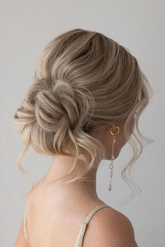 Chic braided updo perfect for backless prom dress styles Elegant updo showcasing prom hairstyles for backless formal dresses with intricate braiding