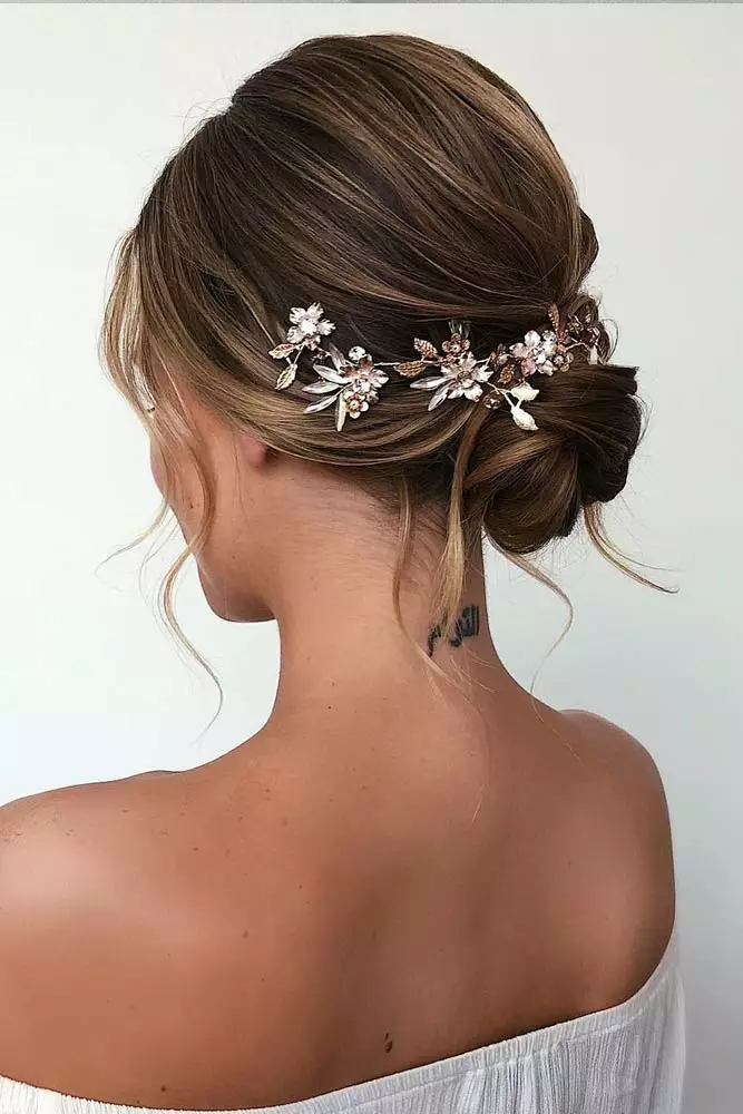Chic and stylish prom updo for short layered hair perfect for special occasions Elegant prom updo hairstyle for short layered hair with soft curls