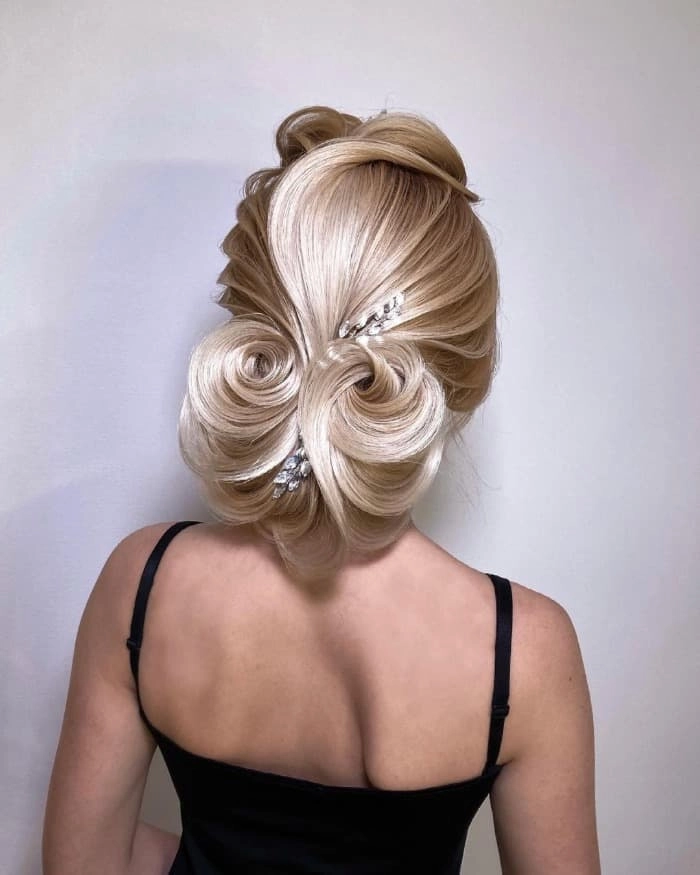 Glamorous medium length prom hairstyle for thick hair inspiration image 6 Elegant medium length prom updo styled on thick hair with soft curls