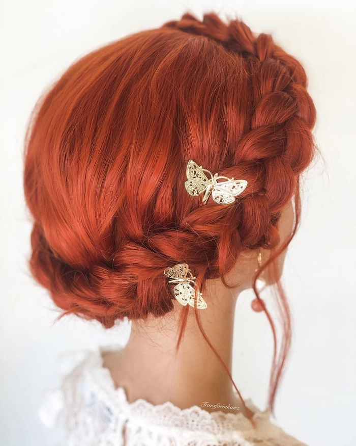 Elegant prom hairstyle with vibrant red hair styled in loose curls