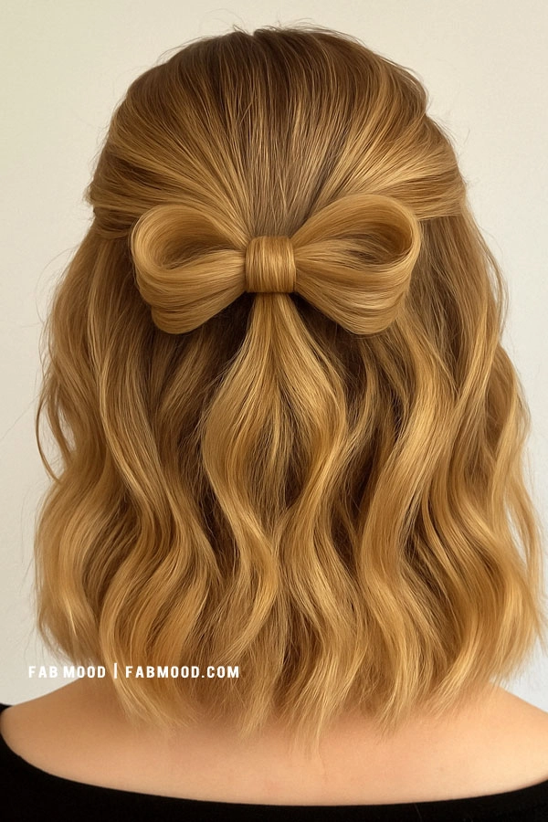 Elegant prom hairstyle featuring a short bob with soft curls and delicate accessories
