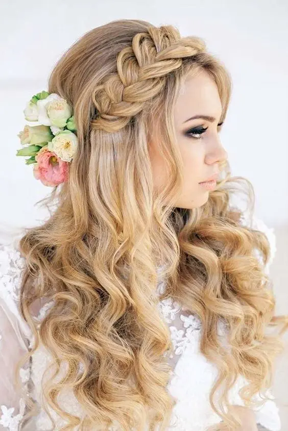 Beautiful fresh bloom hairstyle perfect for spring prom celebrations Elegant spring prom hairstyle adorned with fresh blooms for a radiant look