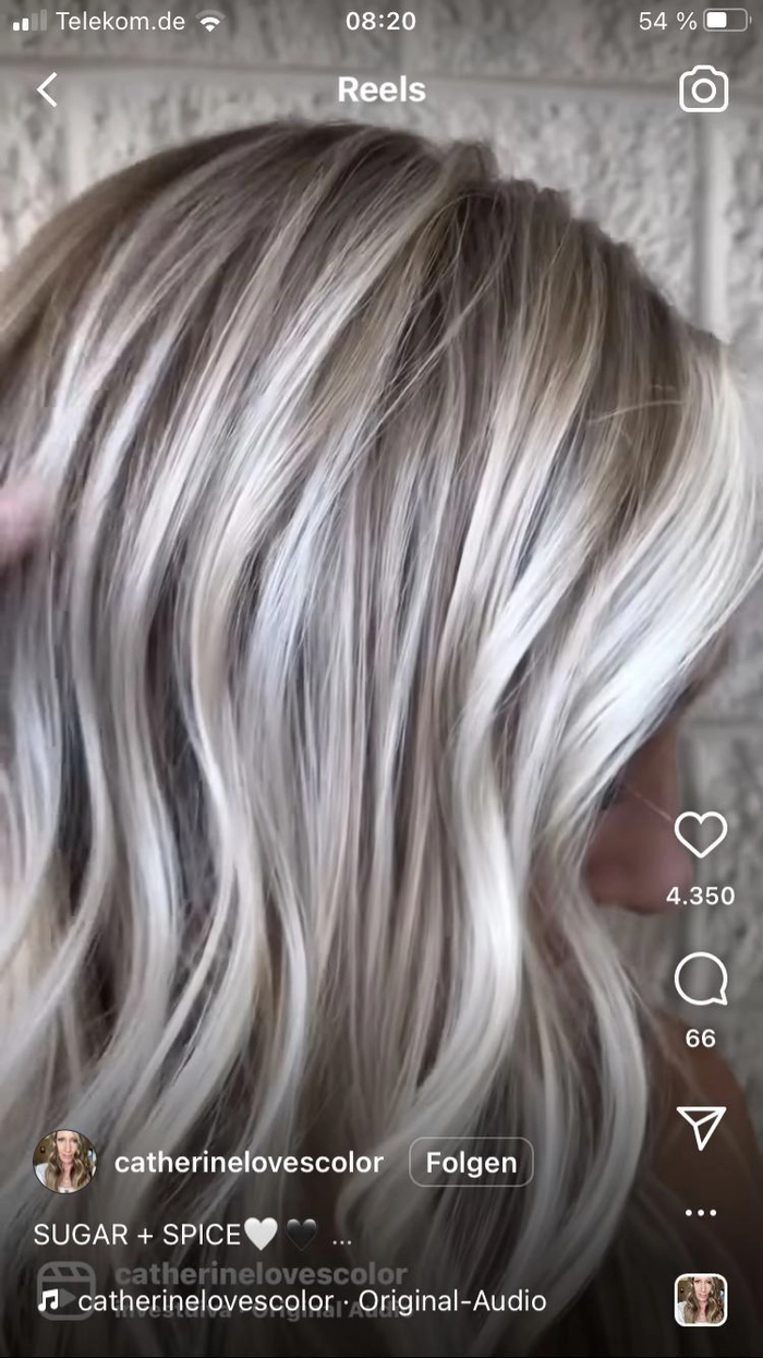 Elegant updo with prom hairstyles for ash blonde highlights showcasing soft curls