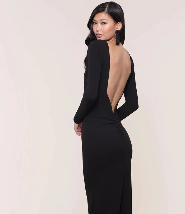 Chic prom hairstyle idea that complements backless evening gowns Elegant updo hairstyle perfect for prom with backless formal dresses