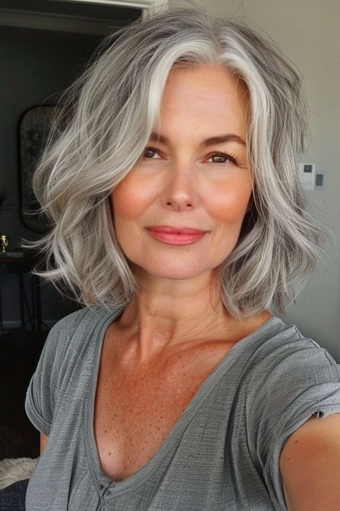 Elegant updo styled prom hairstyle for silver grey hair