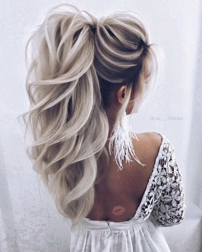 Elegant updo prom hairstyle showcasing silver grey hair with soft curls