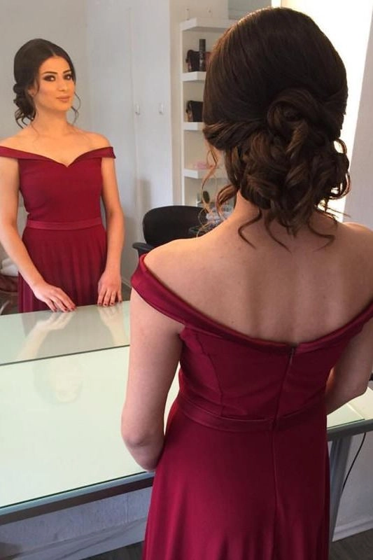 Elegant updo with soft curls perfect for prom hairstyles for off the shoulder dresses