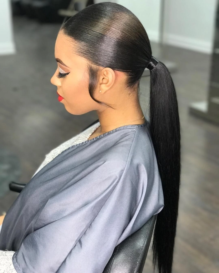 Elegant high sleek ponytail perfect for prom night look number 10 High sleek ponytail prom hairstyle with glossy finish and elegant waves