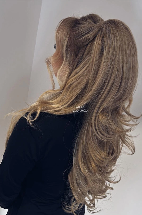 Sophisticated high sleek ponytail perfect for prom hairstyles collection High sleek ponytail styled elegantly for a prom night look