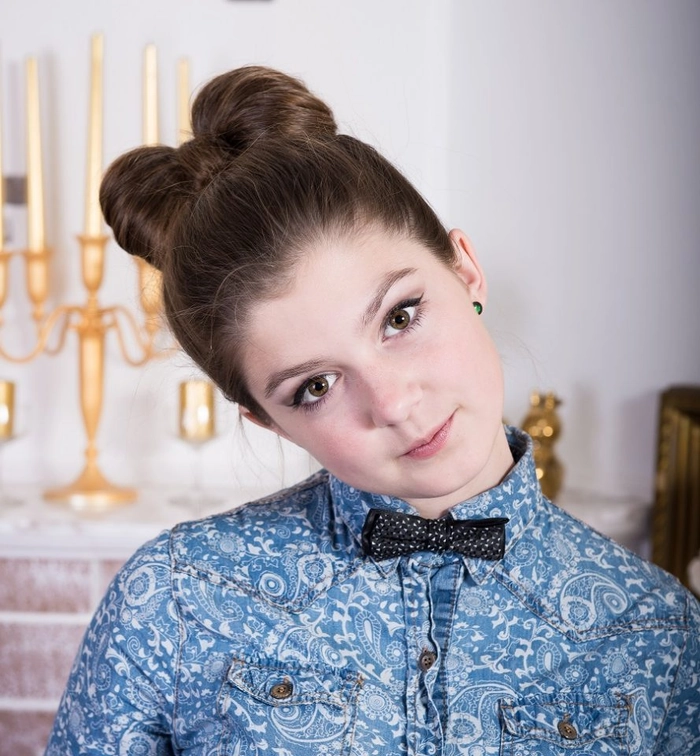 Junior prom hairstyles for middle school students featuring a braided half-updo with soft curls