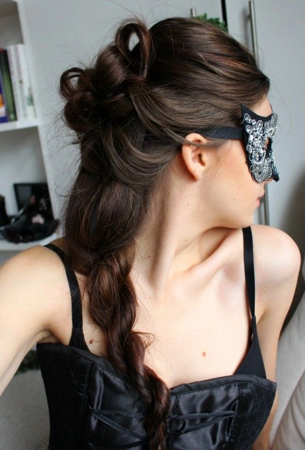 Elegant masquerade ball prom hairstyle with intricate mask details