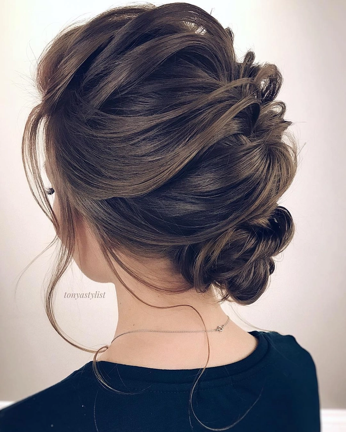 Classy medium length prom hairstyle ideal for thick hair textures Medium length prom updo styled for thick hair with elegant curls