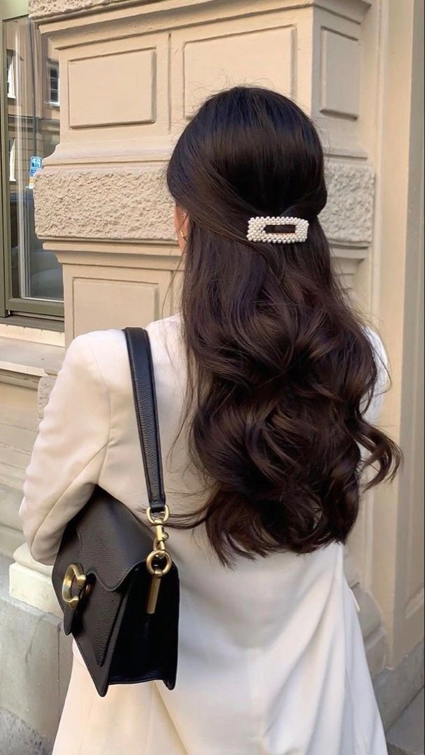 Classic prom hairstyle inspired by timeless old money elegance and sophistication Elegant old money aesthetic prom hairstyle with soft waves and vintage charm