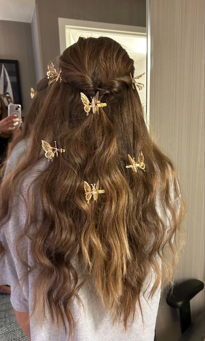 prom hairstyles with butterfly hair pins image