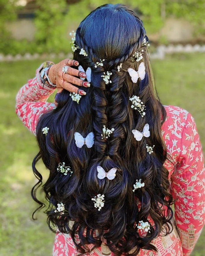 prom hairstyles with butterfly hair pins image