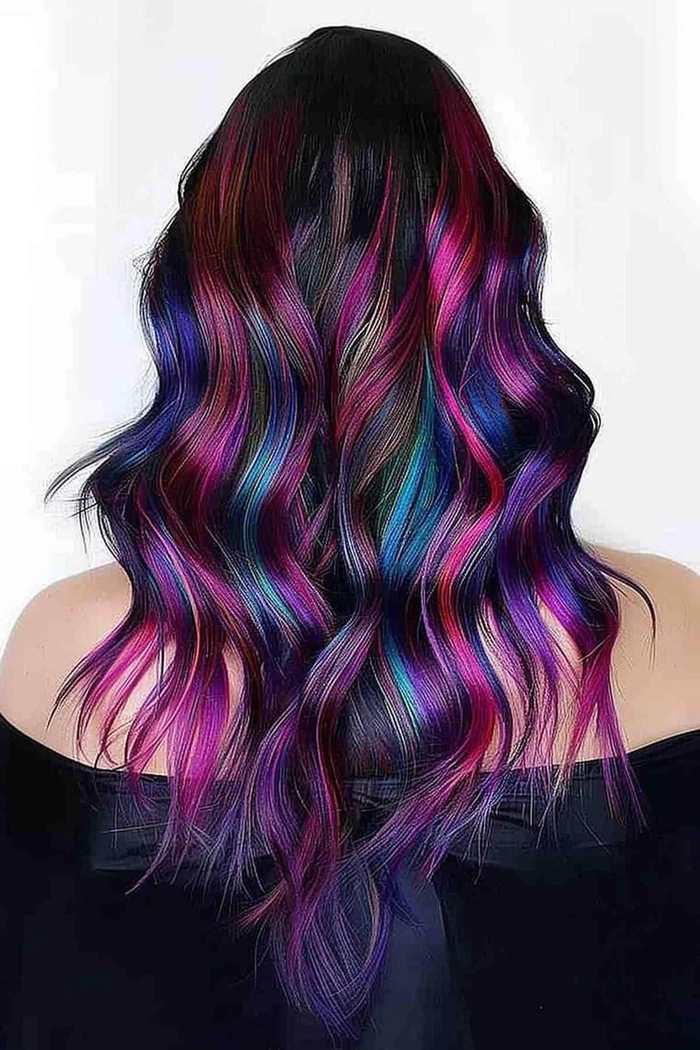 Prom hairstyle showcasing vibrant rainbow color treated hair with elegant curls