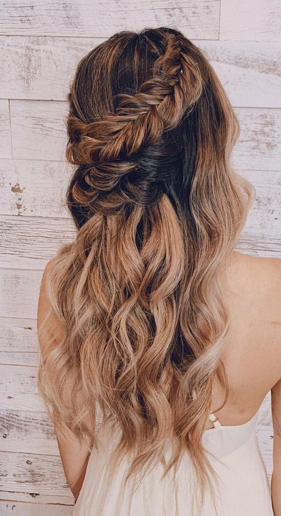 Romantic updo with an intricate fishtail braid for prom