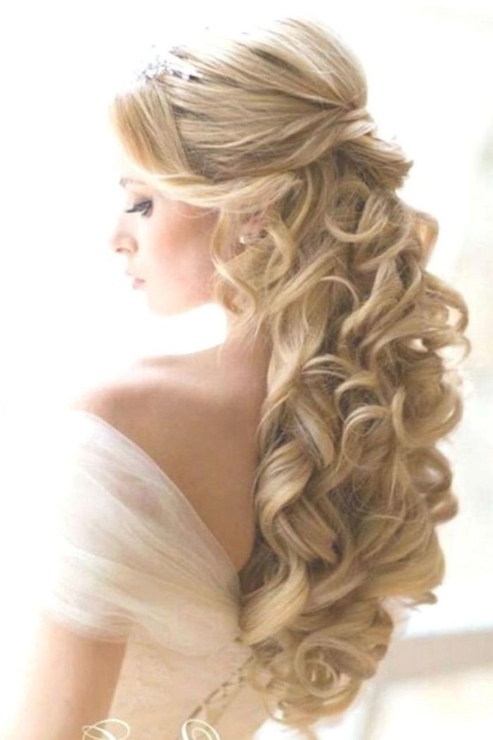 Elegant side swept prom hairstyle perfect for a romantic evening look Romantic loose side swept prom hairstyle with soft curls and delicate accessories