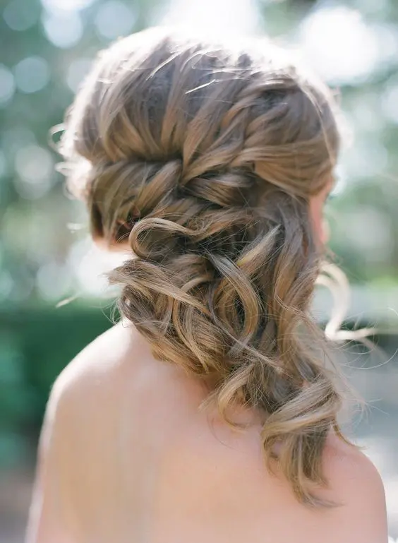 Elegant side swept prom hairstyle perfect for a romantic look Romantic loose side swept prom hairstyle with soft waves