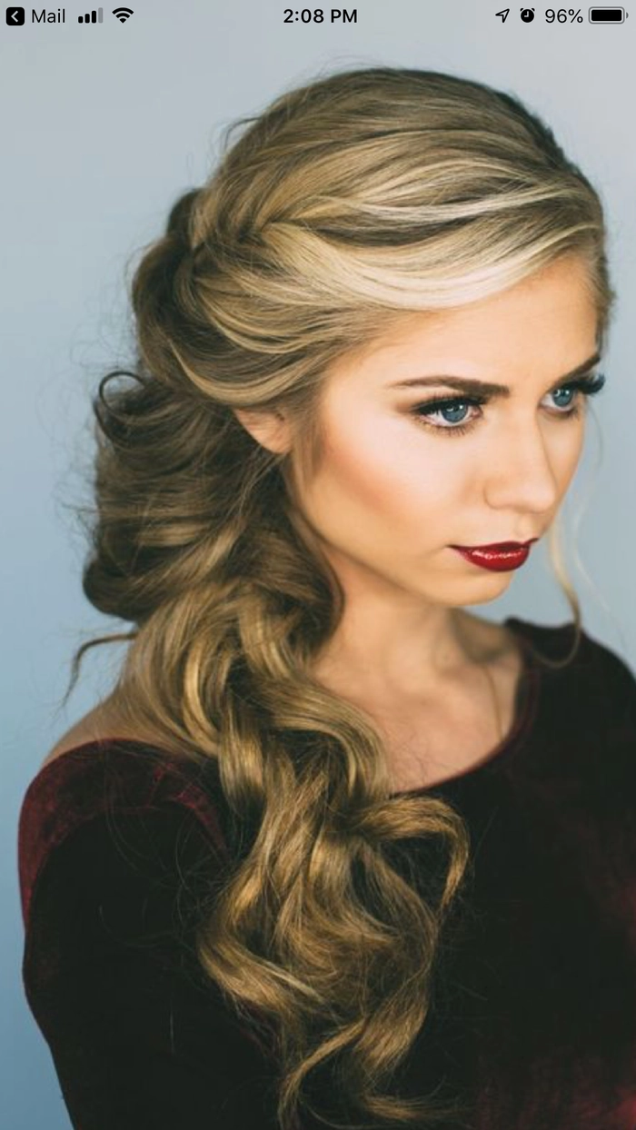 Elegant side swept prom hairstyle perfect for a romantic look on prom night Romantic loose side swept prom hairstyles with soft curls and delicate accessories