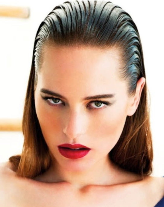 Elegant wet look slicked back prom hairstyle with glossy finish