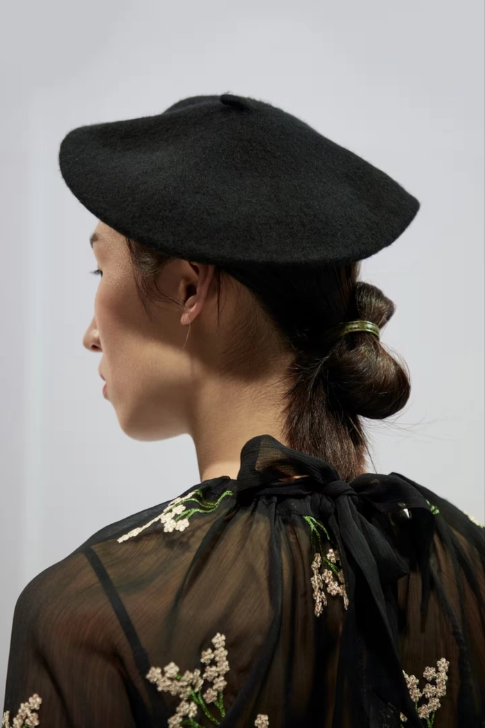 Windproof outdoor prom hairstyle with braided crown and secure hold