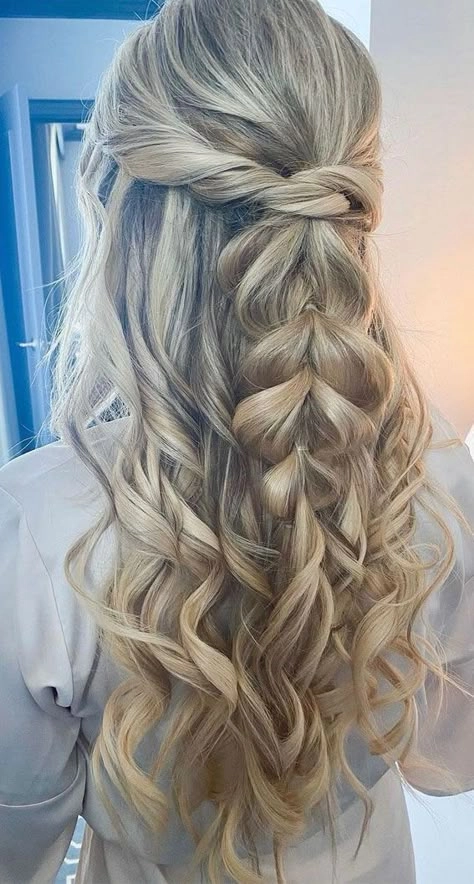 Windproof outdoor prom hairstyle with braided crown and secure pins